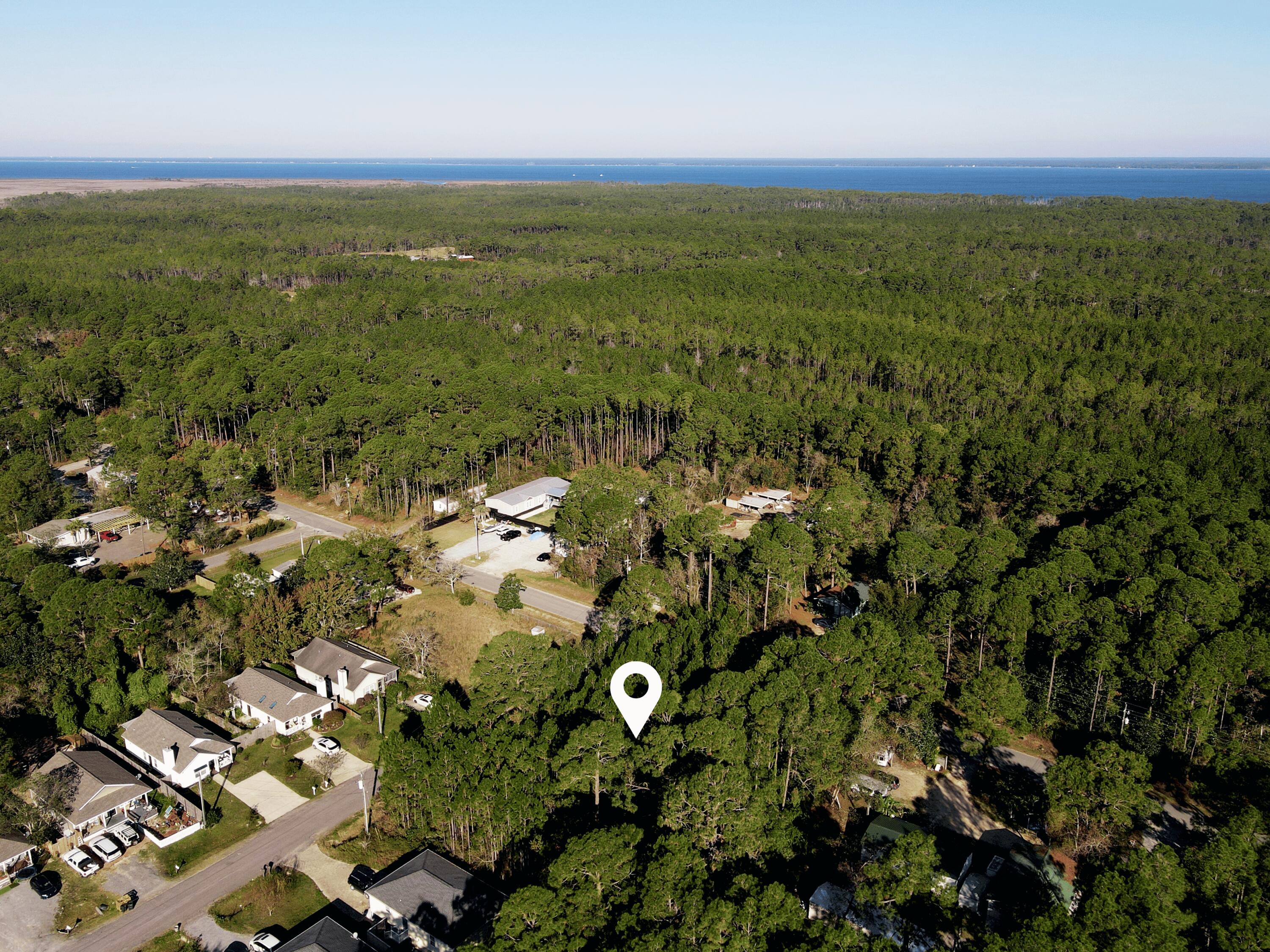 Lot22-blk5 North 6th Street Santa Rosa Beach, FL 32459 - Photo 3 of 4 an aerial view of residential houses with outdoor space and trees