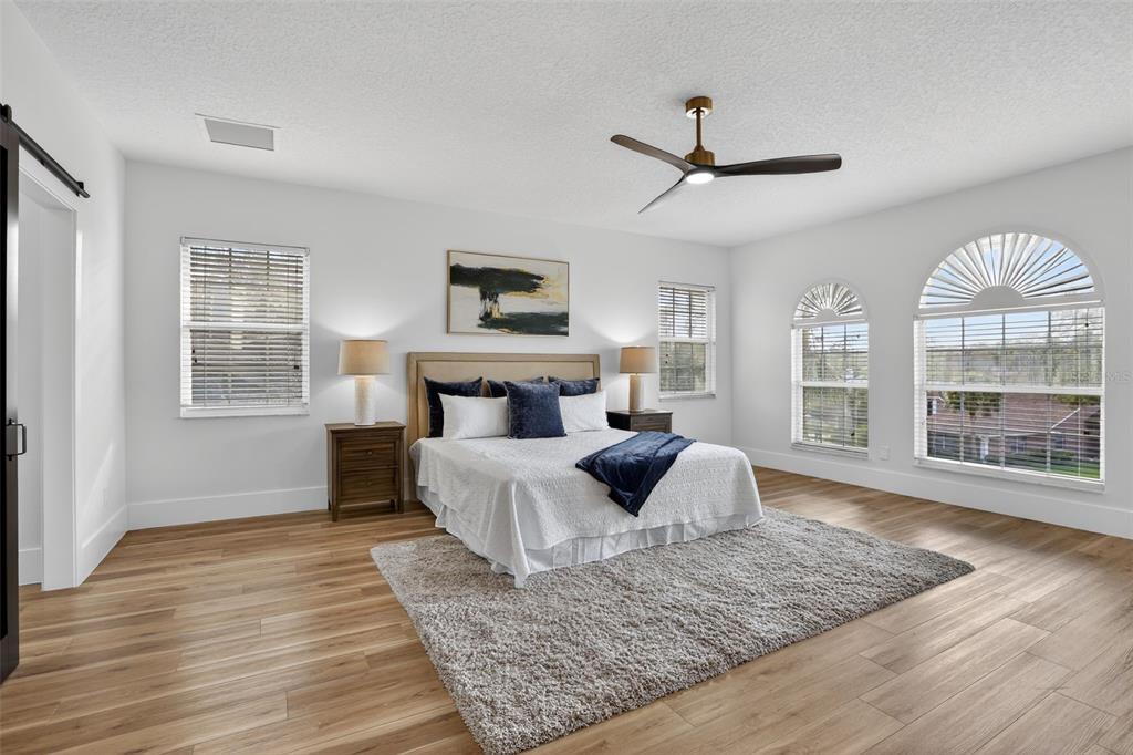 1815 Seneca Boulevard Winter Springs, FL 32708 - Photo 17 of 32 a living room with furniture and a large window