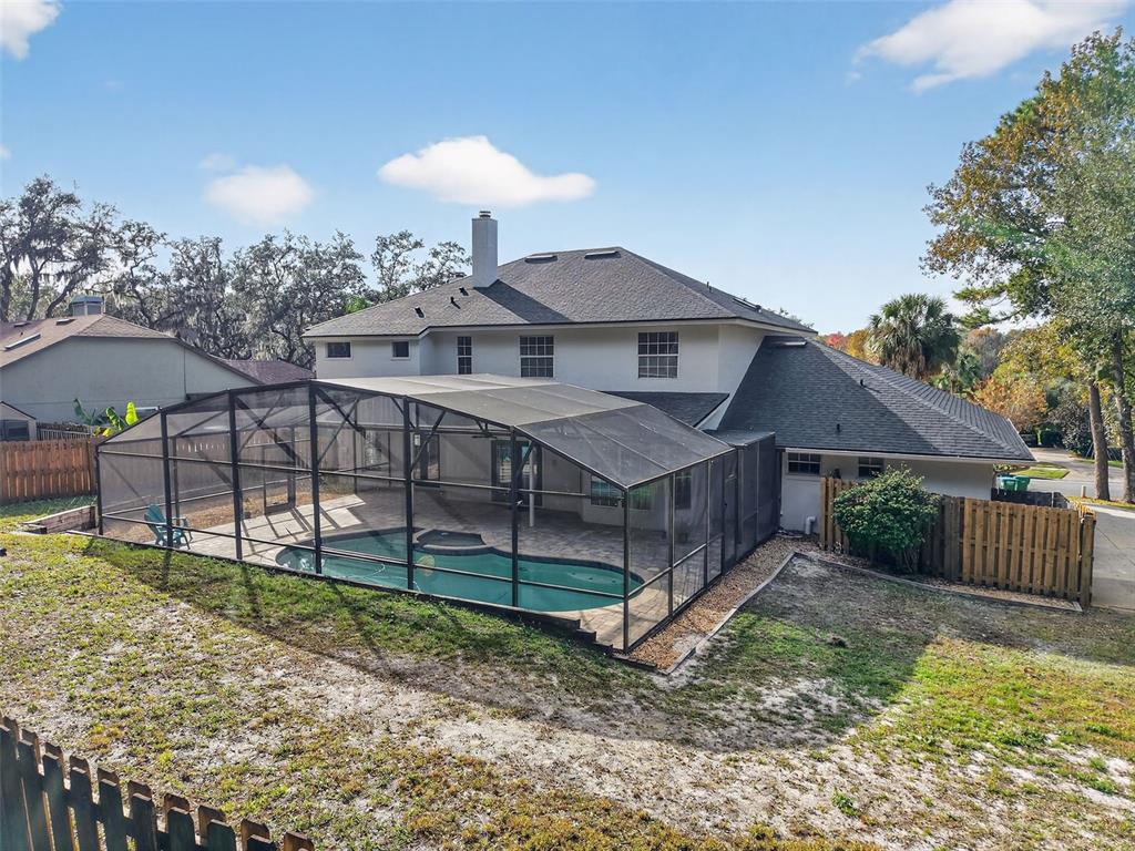 1815 Seneca Boulevard Winter Springs, FL 32708 - Photo 29 of 32 a view of a house with wooden fence