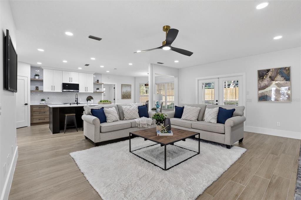 1815 Seneca Boulevard Winter Springs, FL 32708 - Photo 9 of 32 a living room with furniture and a view of kitchen
