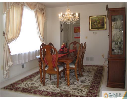 31 Lexington Road Monmouth Junction, NJ 08852 - Photo 7 of 12 a dining room with furniture and window
