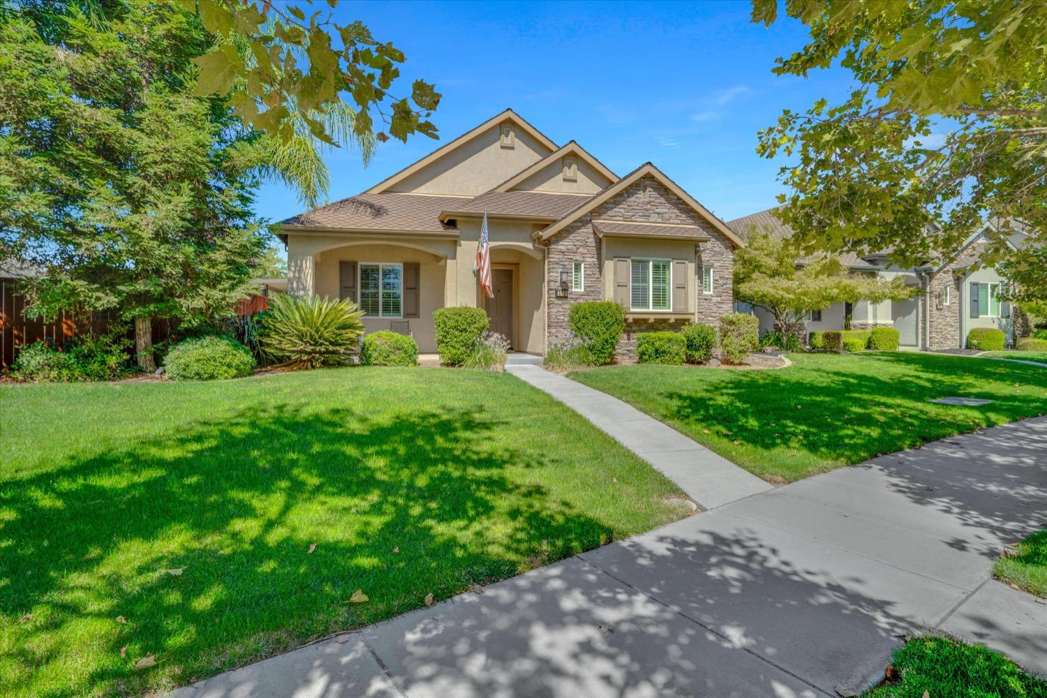 373 Marble Lane Ripon, CA 95366 - Photo 1 of 1 a front view of a house with a yard