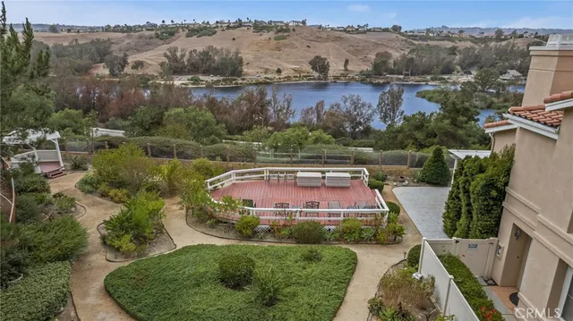 an aerial view of a house with a garden