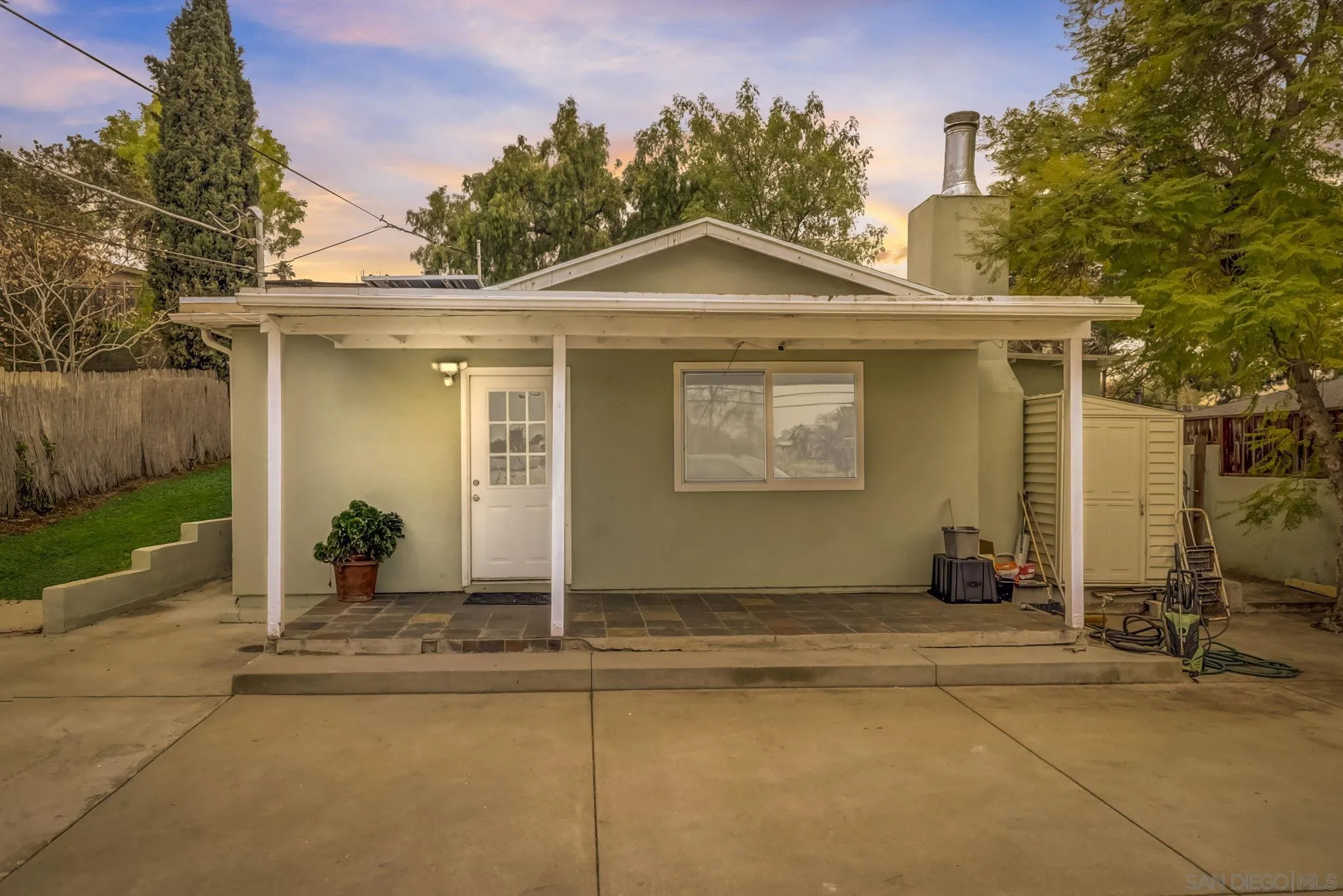 a front view of a house with yard