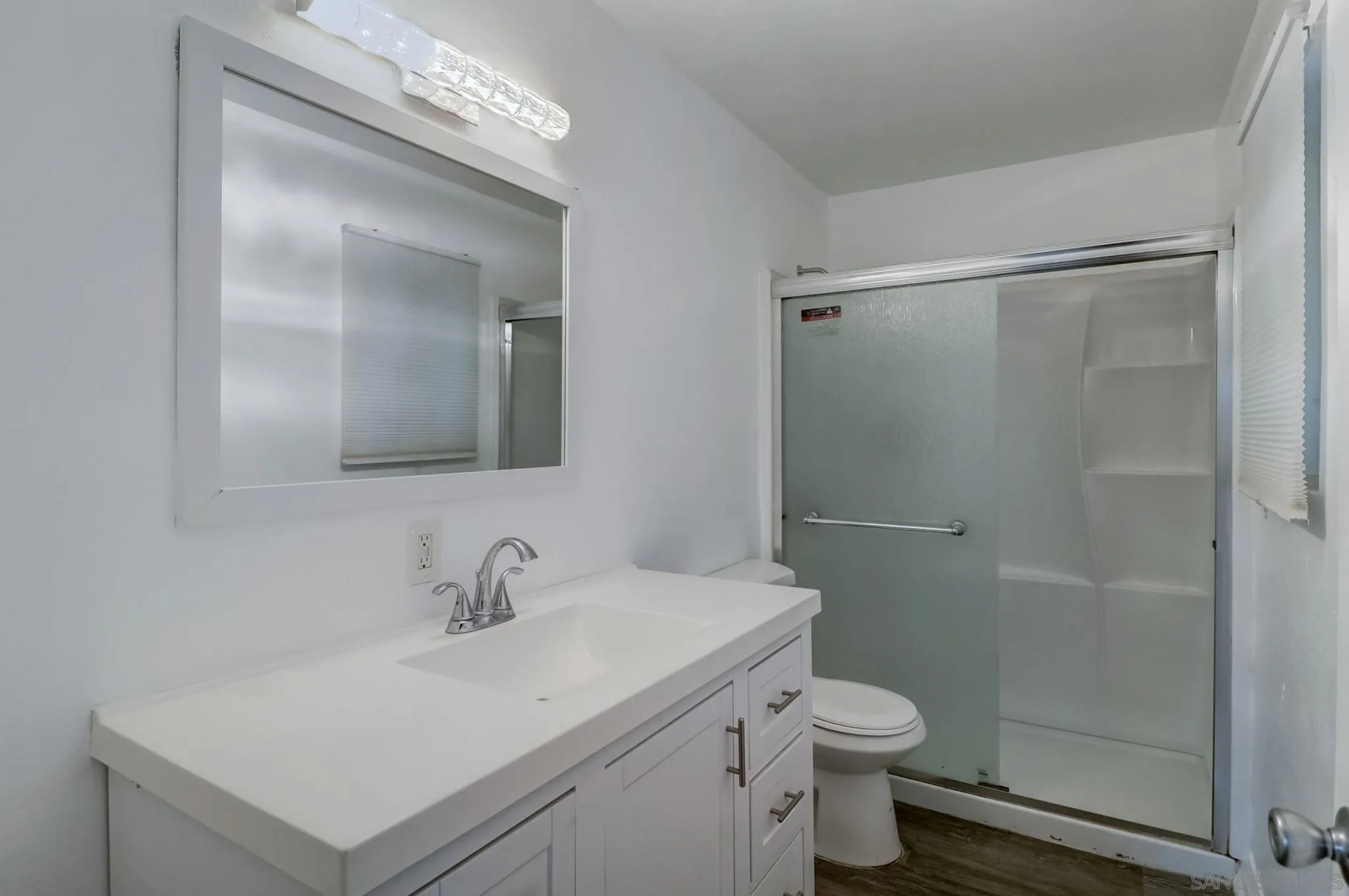9115 Rosedale Drive Spring Valley, CA 91977 - Photo 24 of 31 a bathroom with a sink toilet and shower