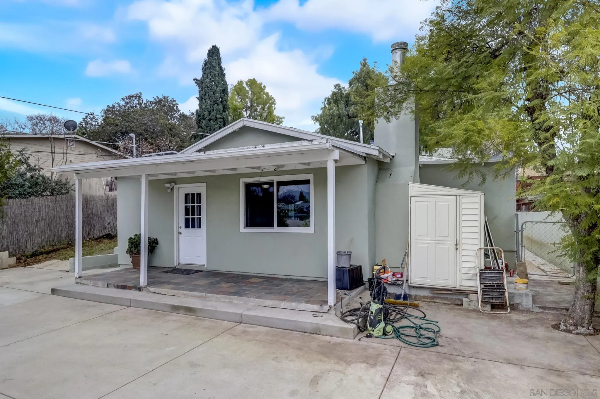 9115 Rosedale Drive Spring Valley, CA 91977 - Photo 5 of 31 a front view of a house with garden