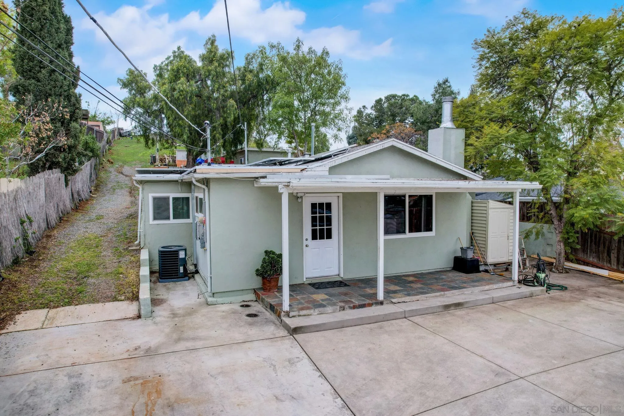 9115 Rosedale Drive Spring Valley, CA 91977 - Photo 7 of 31 a view of a house with a patio