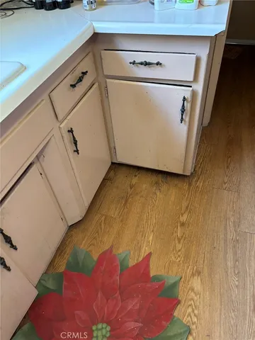 a view of a balcony with wooden floor