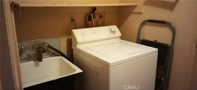 a close up view of washer and dryer