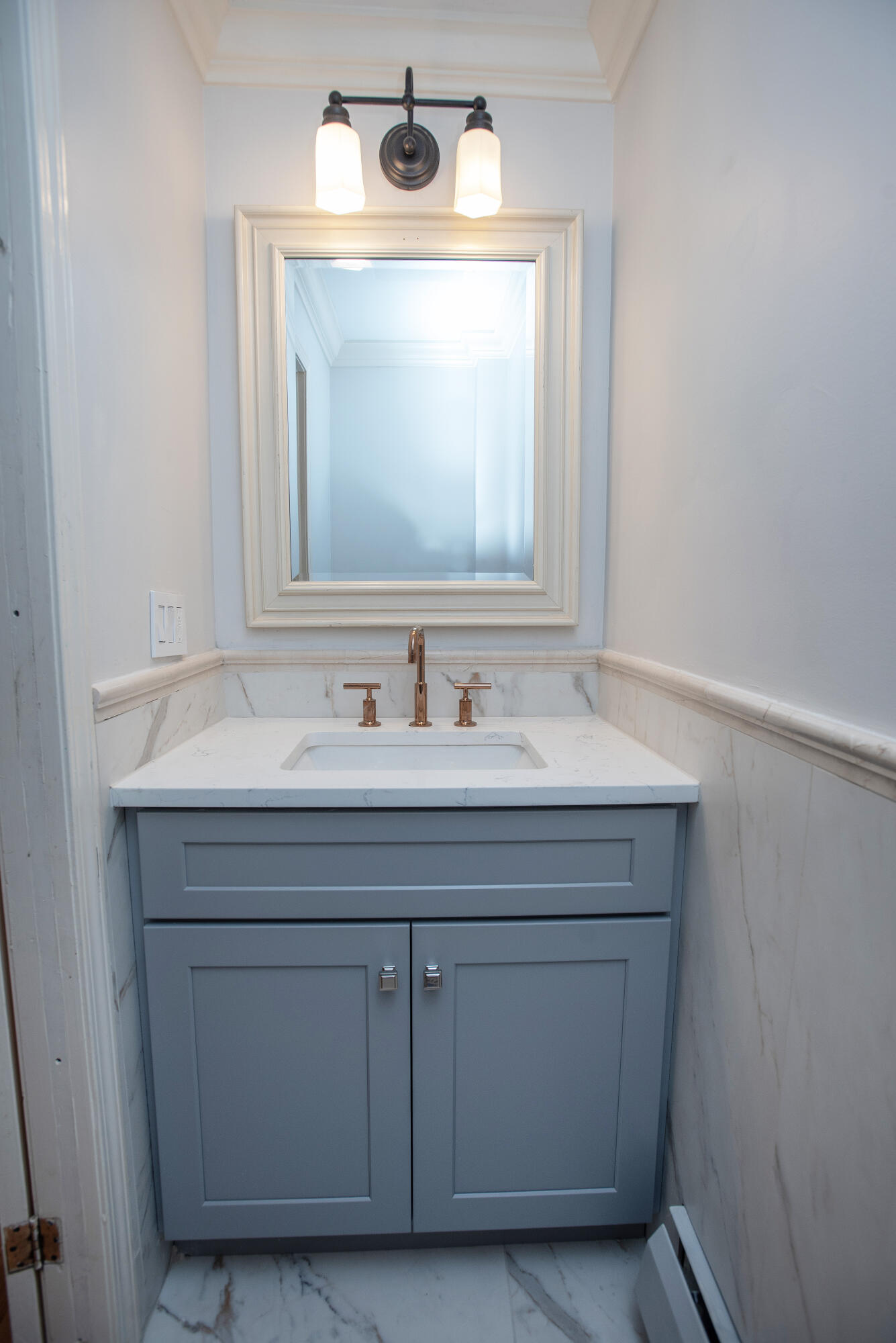 167 Park Street New Canaan, CT 06840 - Photo 15 of 18 a bathroom with a sink vanity and mirror