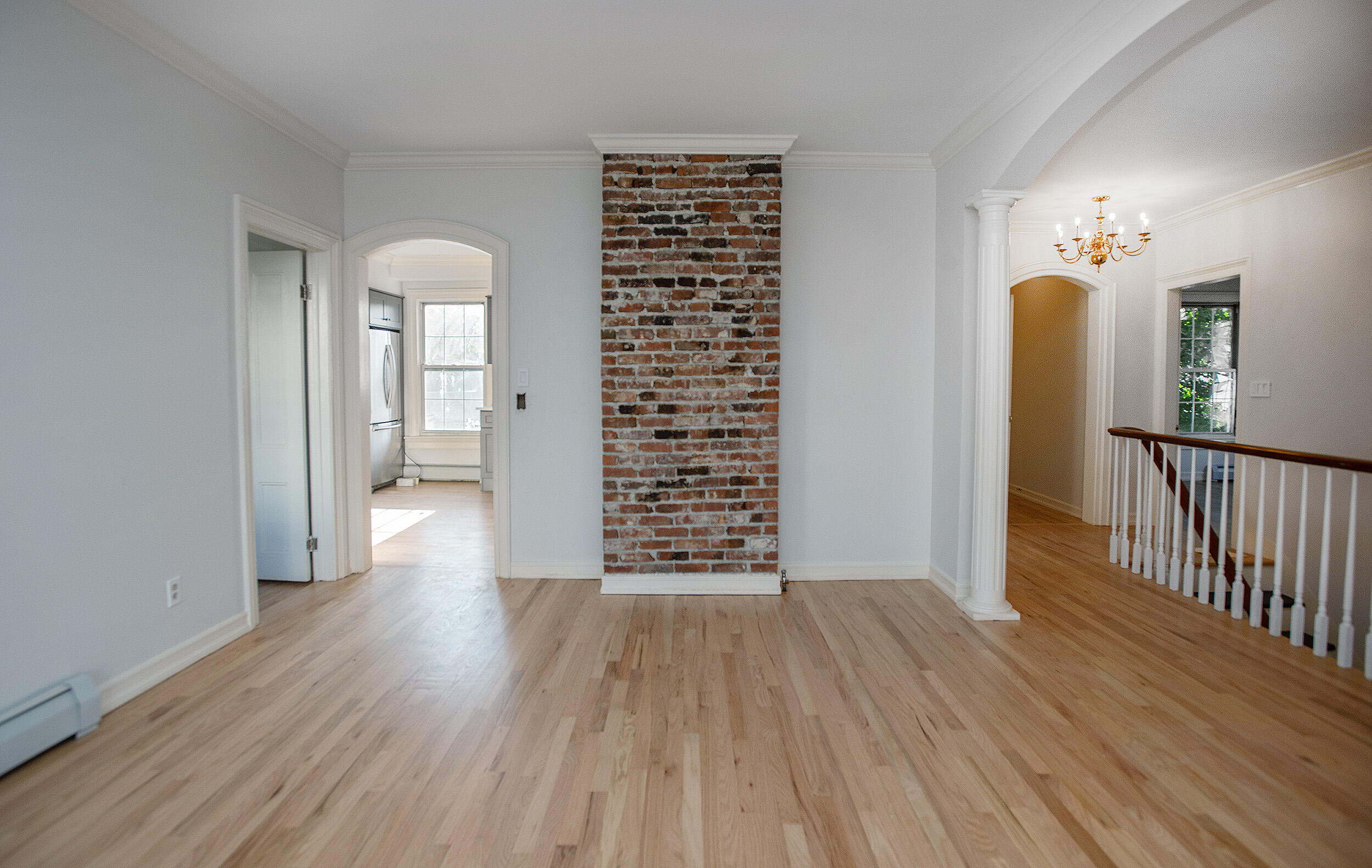 167 Park Street New Canaan, CT 06840 - Photo 4 of 18 wooden floor in an empty room with a window