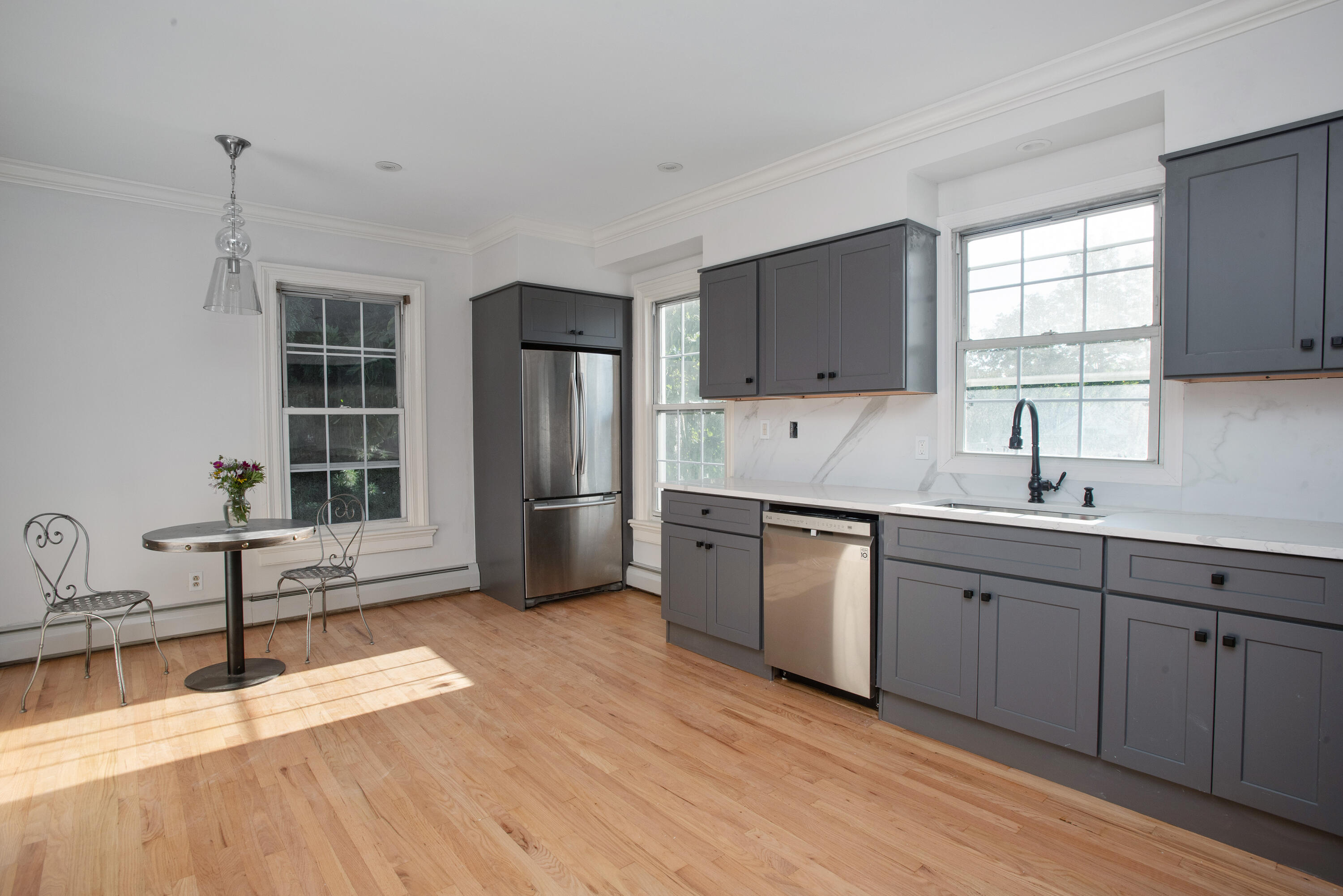 167 Park Street New Canaan, CT 06840 - Photo 7 of 18 a kitchen with a sink cabinets and window