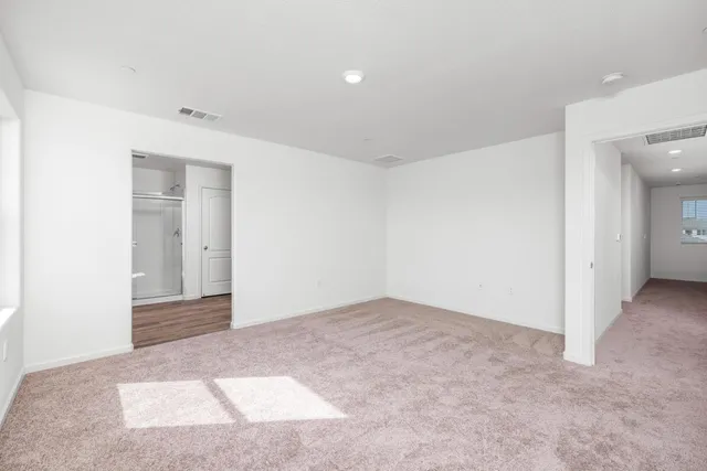 an empty room with an entryway