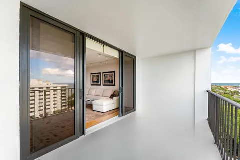 a view of balcony with furniture