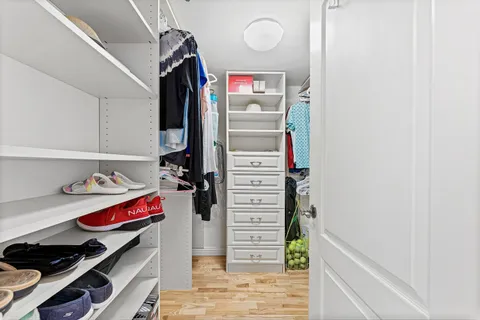 swimming pool view with a seating space