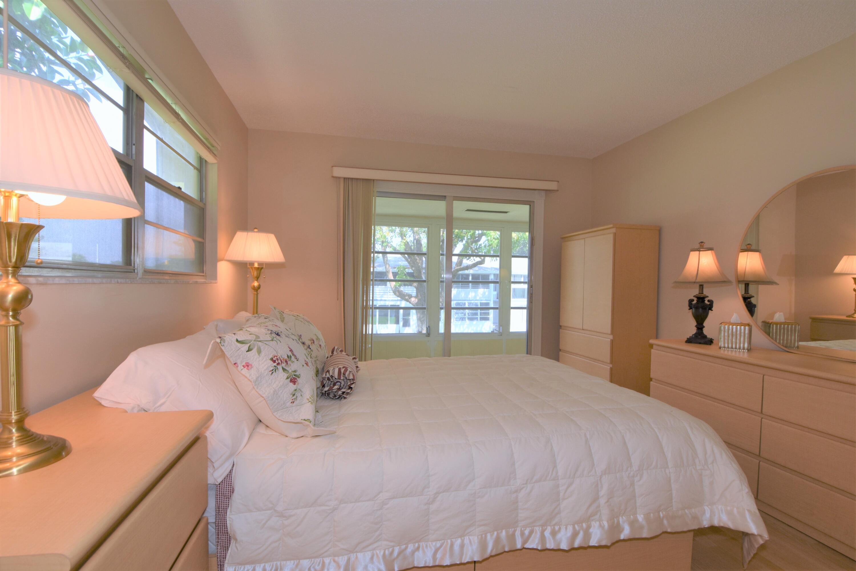 120 Upminster Crescent, Unit E Deerfield Beach, FL 33442 - Photo 19 of 36 Master Bedroom