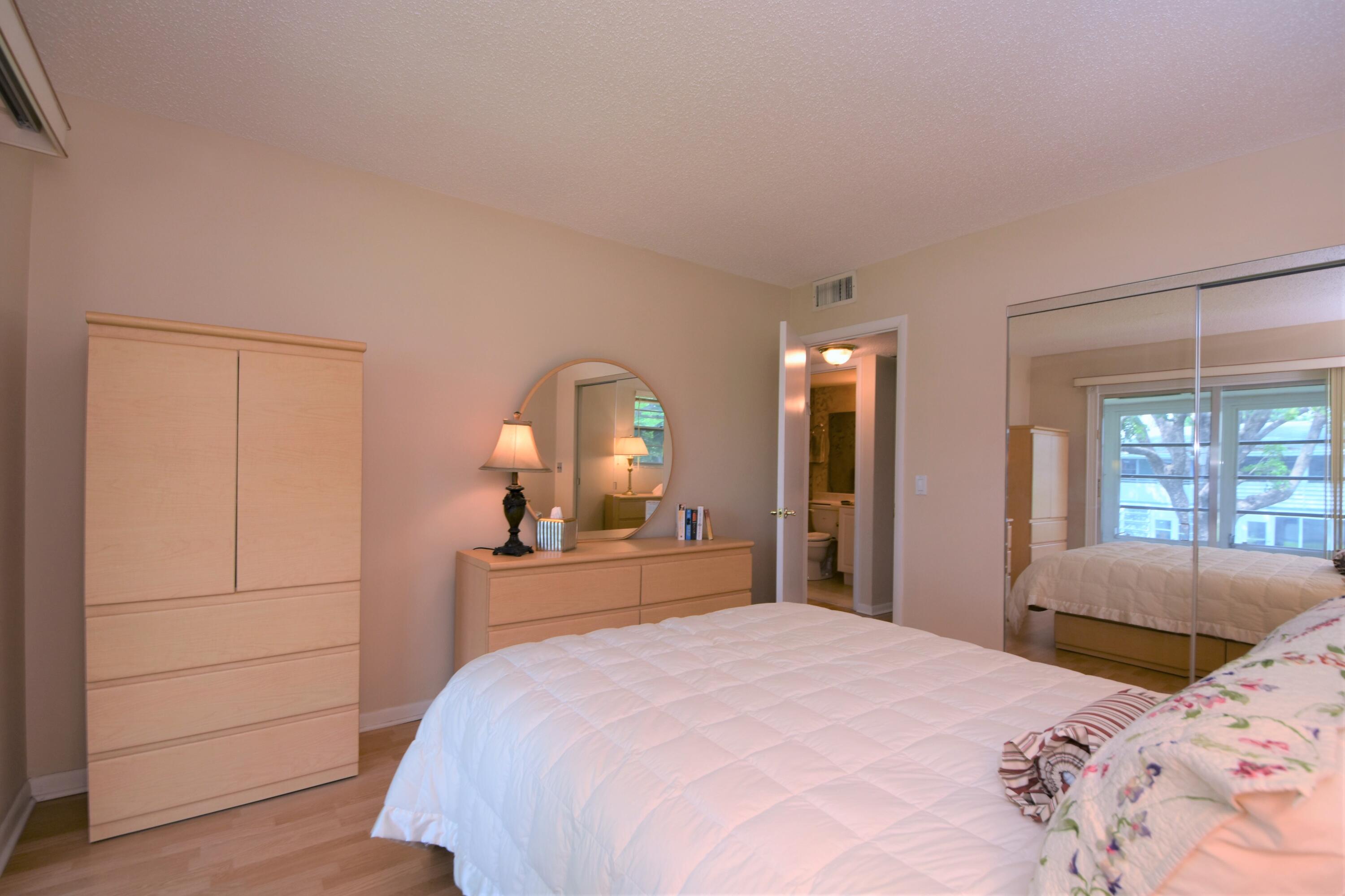 120 Upminster Crescent, Unit E Deerfield Beach, FL 33442 - Photo 20 of 36 Master Bedroom