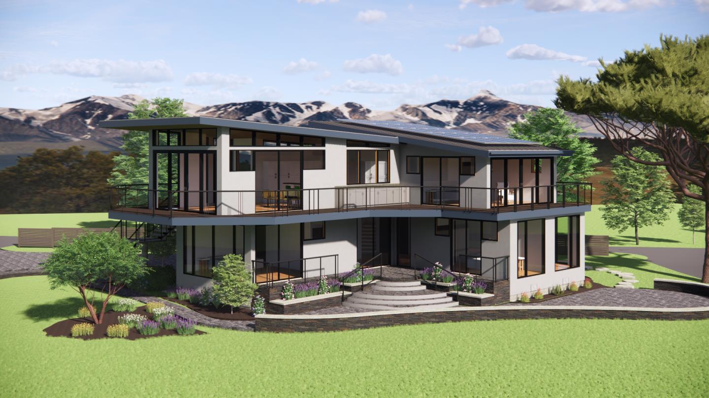 155 Reef Point Road Moss Beach, CA 94038 - Photo 2 of 16 a front view of a house with a yard table and chairs