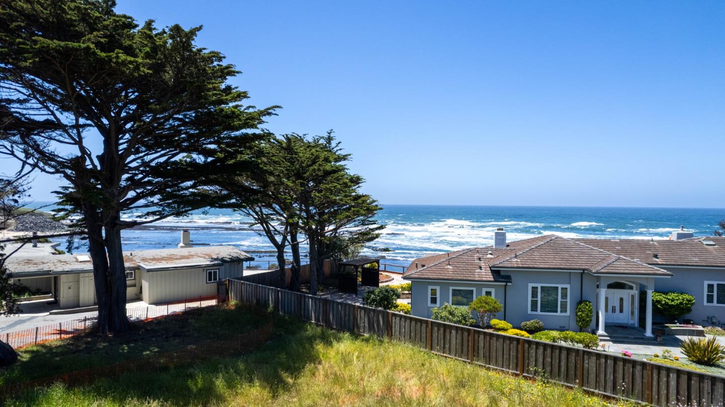 155 Reef Point Road Moss Beach, CA 94038 - Photo 4 of 16 swimming pool view with a seating space and a ocean view in the background