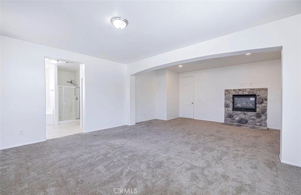 43839 58th Street West Lancaster, CA 93536 - Photo 13 of 18 a view of an empty room with a window
