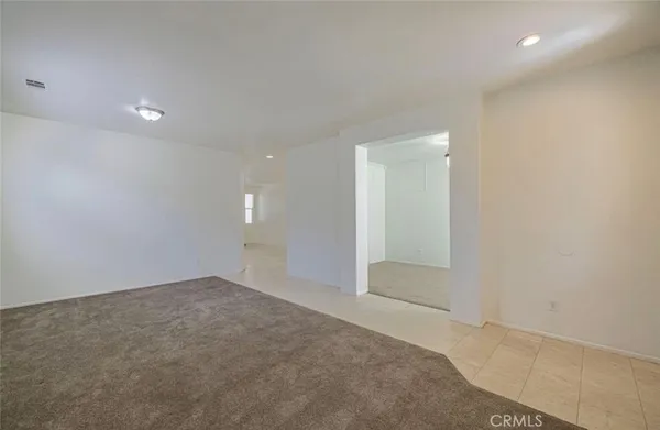 an empty room with an entryway