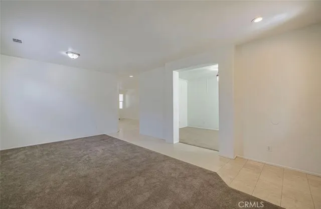 an empty room with an entryway