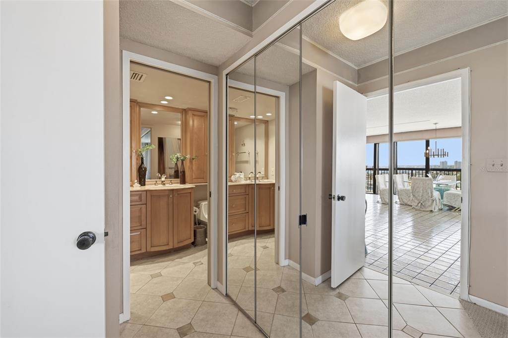 9495 Blind Pass Road, Unit 1208 St. Pete Beach, FL 33706 - Photo 15 of 61 a bathroom with a shower and a sink