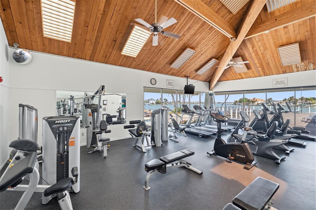 9495 Blind Pass Road, Unit 1208 St. Pete Beach, FL 33706 - Photo 56 of 62 a view of a room with gym equipment
