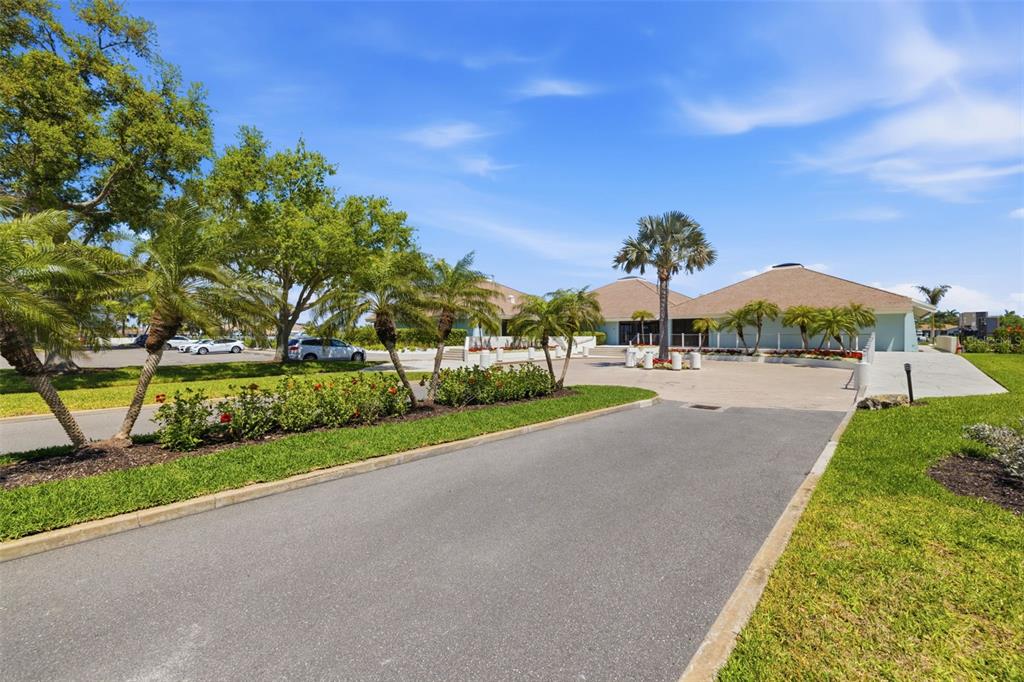9495 Blind Pass Road, Unit 1208 St. Pete Beach, FL 33706 - Photo 61 of 62 a view of outdoor space yard and mountain view in back
