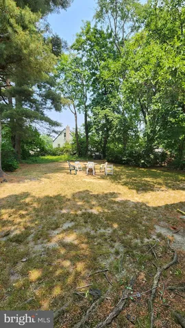 a view of a swimming pool and an outdoor space