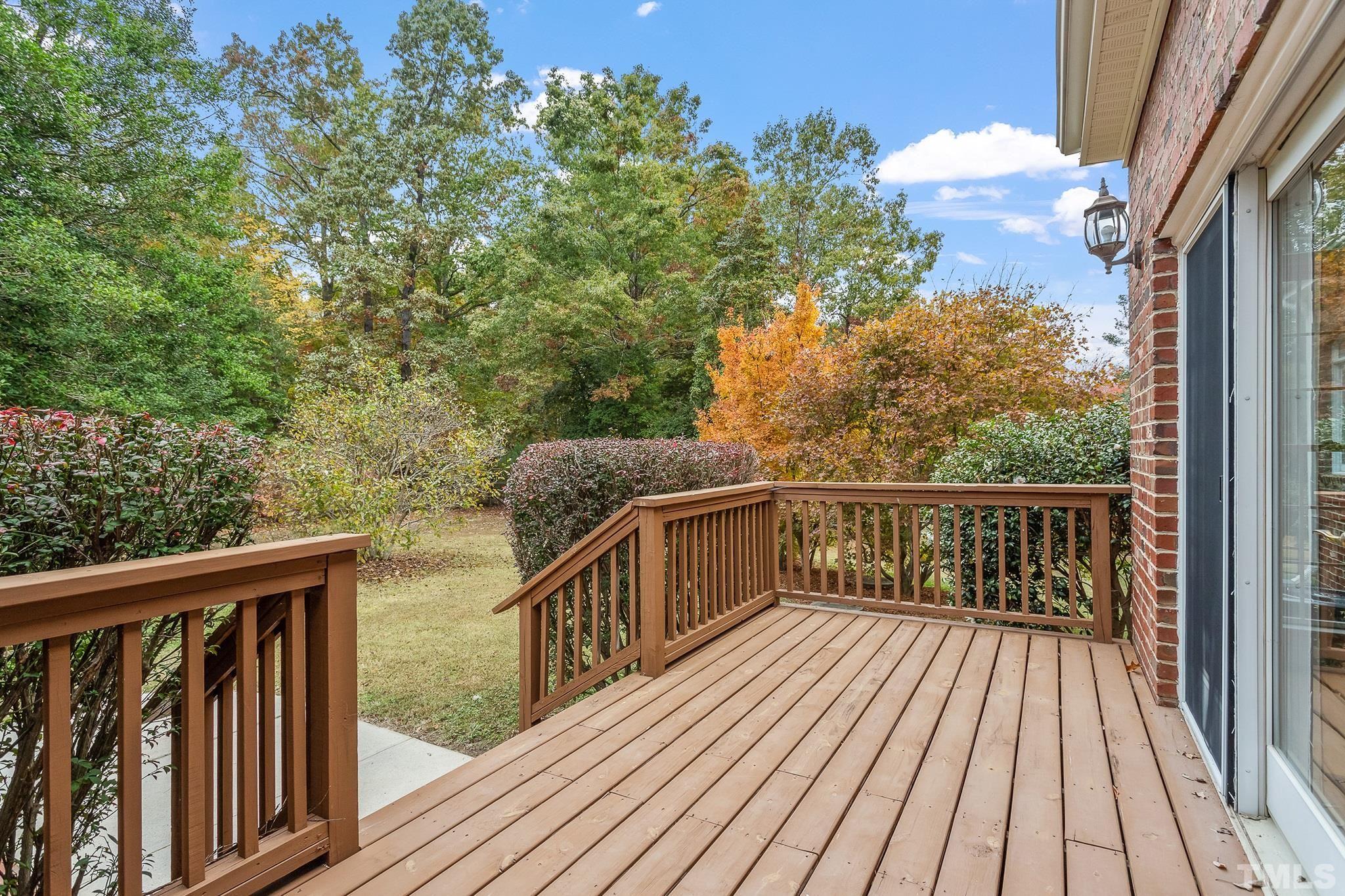 4025 Cuchalain Road Raleigh, NC 27616 - Photo 18 of 34 a view of balcony with wooden floor and fence