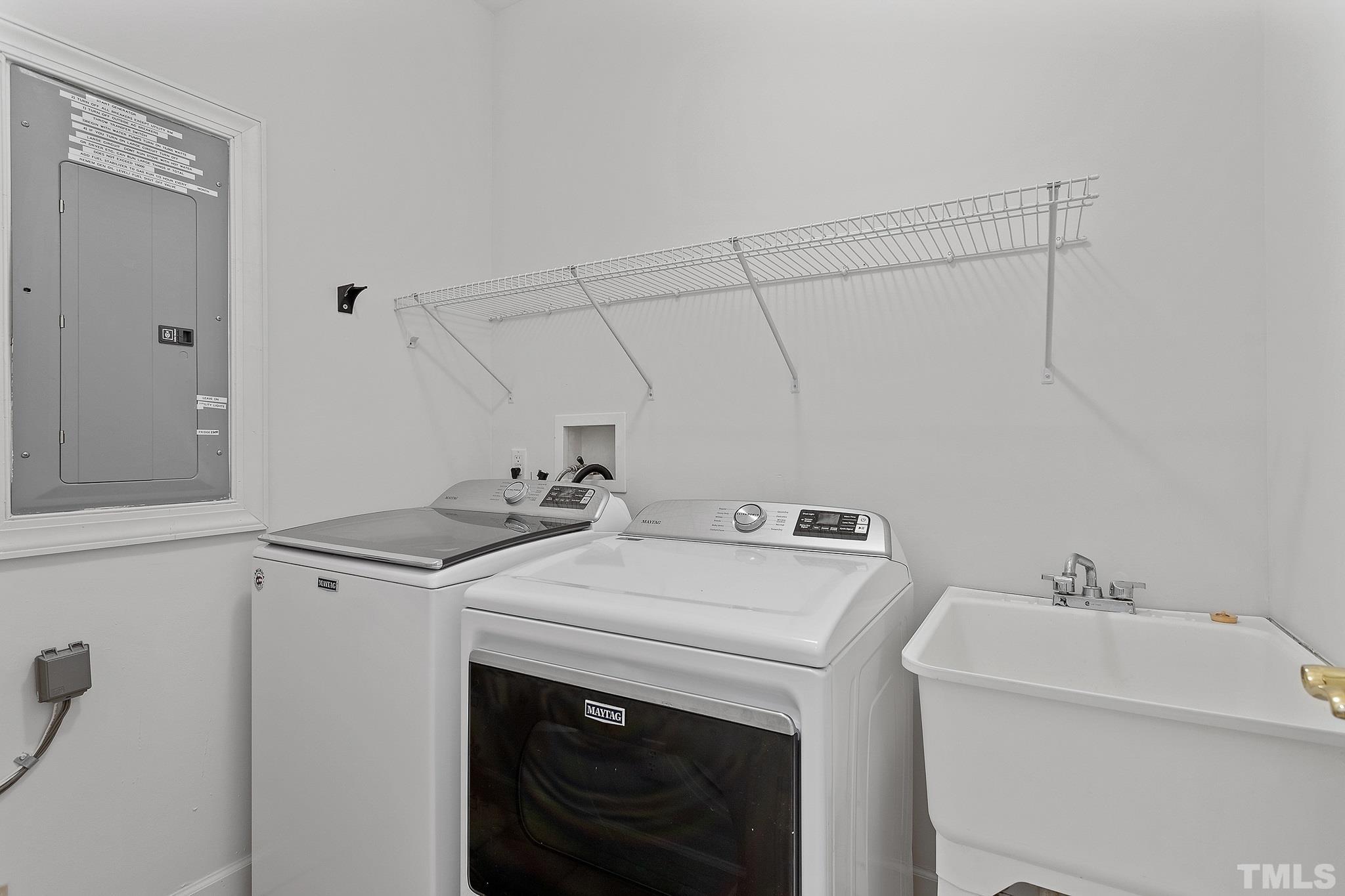 4025 Cuchalain Road Raleigh, NC 27616 - Photo 31 of 34 a utility room with dryer and washer