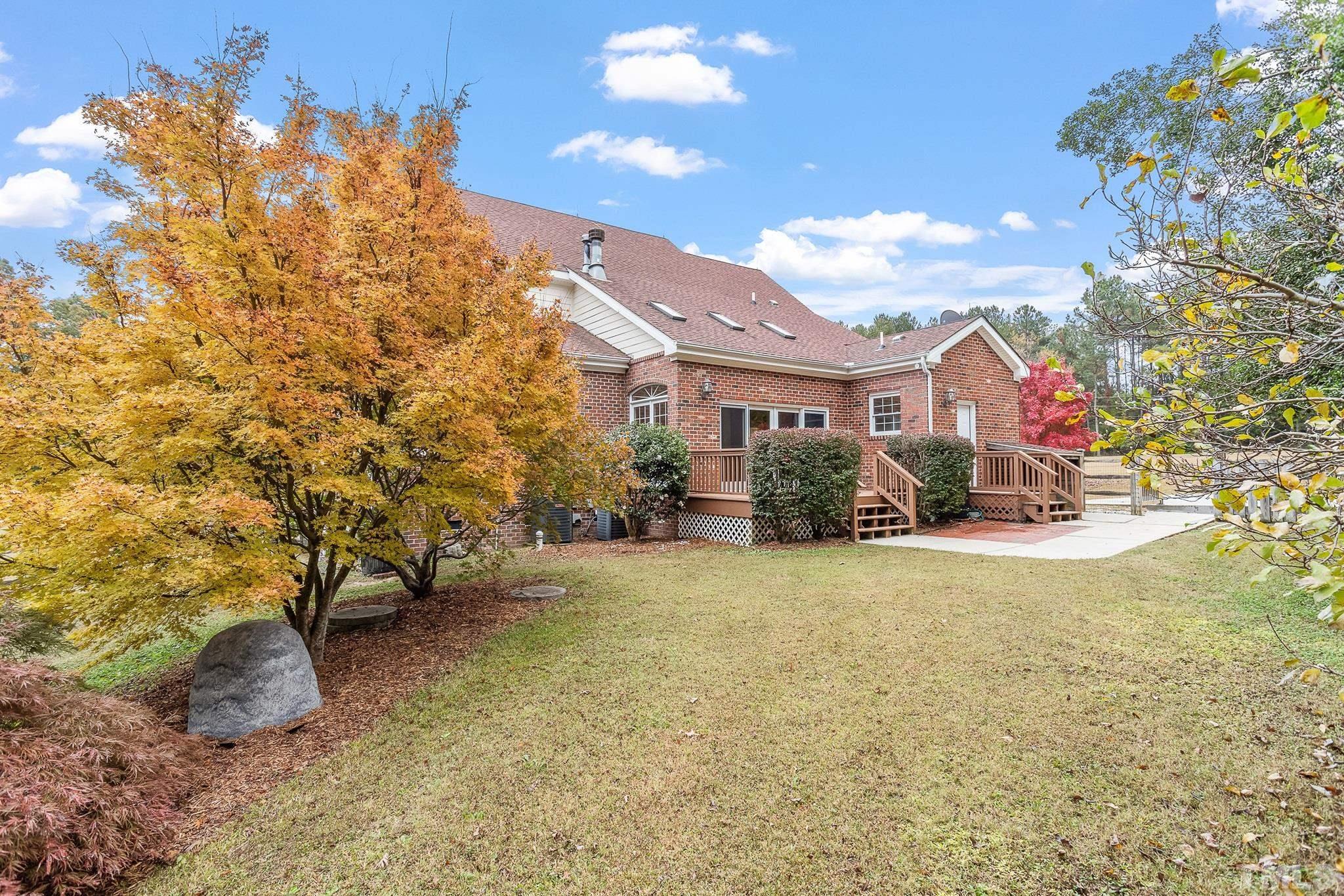4025 Cuchalain Road Raleigh, NC 27616 - Photo 5 of 34 a view of a house with a yard