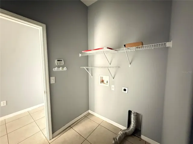 a view of kitchen with cabinets and wooden floor