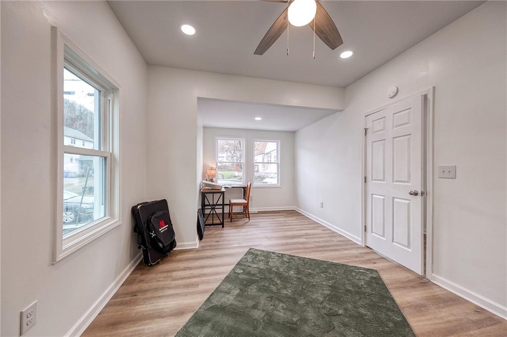 1415 Pacific Avenue Monaca, PA 15061 - Photo 13 of 39 a view of a livingroom with a chair and a window