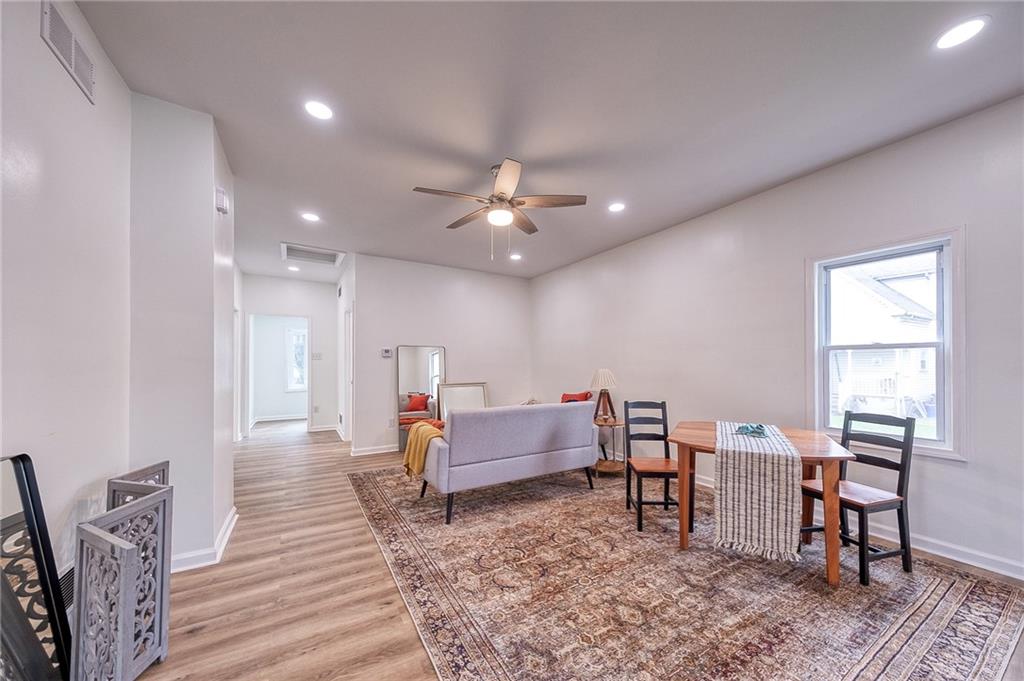 1415 Pacific Avenue Monaca, PA 15061 - Photo 23 of 39 a living room with furniture and a chandelier