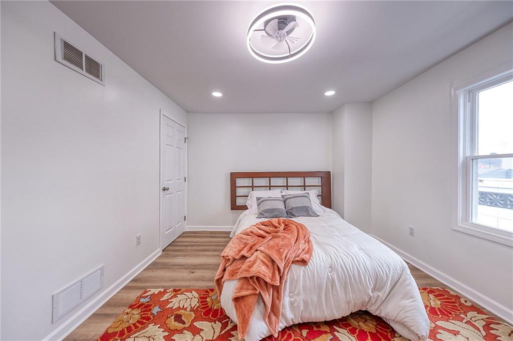 1415 Pacific Avenue Monaca, PA 15061 - Photo 30 of 39 a bedroom with a bed and a window