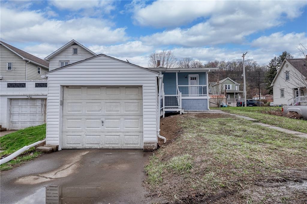 1415 Pacific Avenue Monaca, PA 15061 - Photo 38 of 39 a front view of a house with a yard