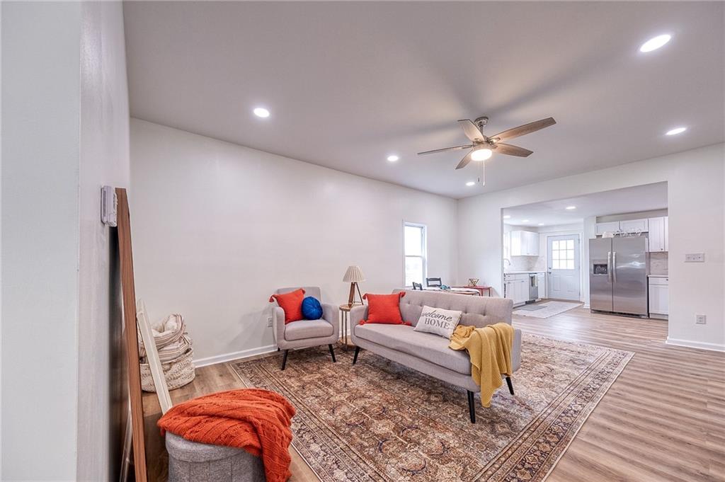 1415 Pacific Avenue Monaca, PA 15061 - Photo 6 of 39 a living room with furniture and a chandelier