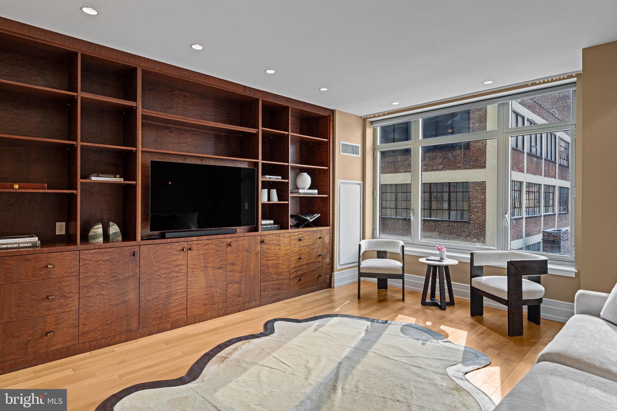 130 South 18th Street, Unit 503 Philadelphia, PA 19103 - Photo 13 of 43 a bed room with a bed and furniture