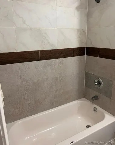 a bathroom with a bathtub