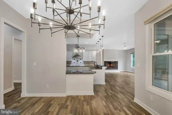 a kitchen with appliances and cabinets