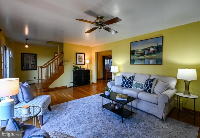 a kitchen with stainless steel appliances a stove cabinets and a window