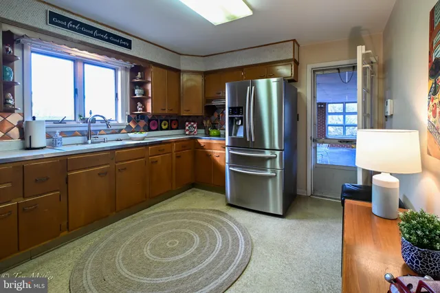 a bathroom with a toilet and a sink