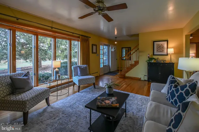 a kitchen with stainless steel appliances granite countertop a refrigerator sink and cabinets