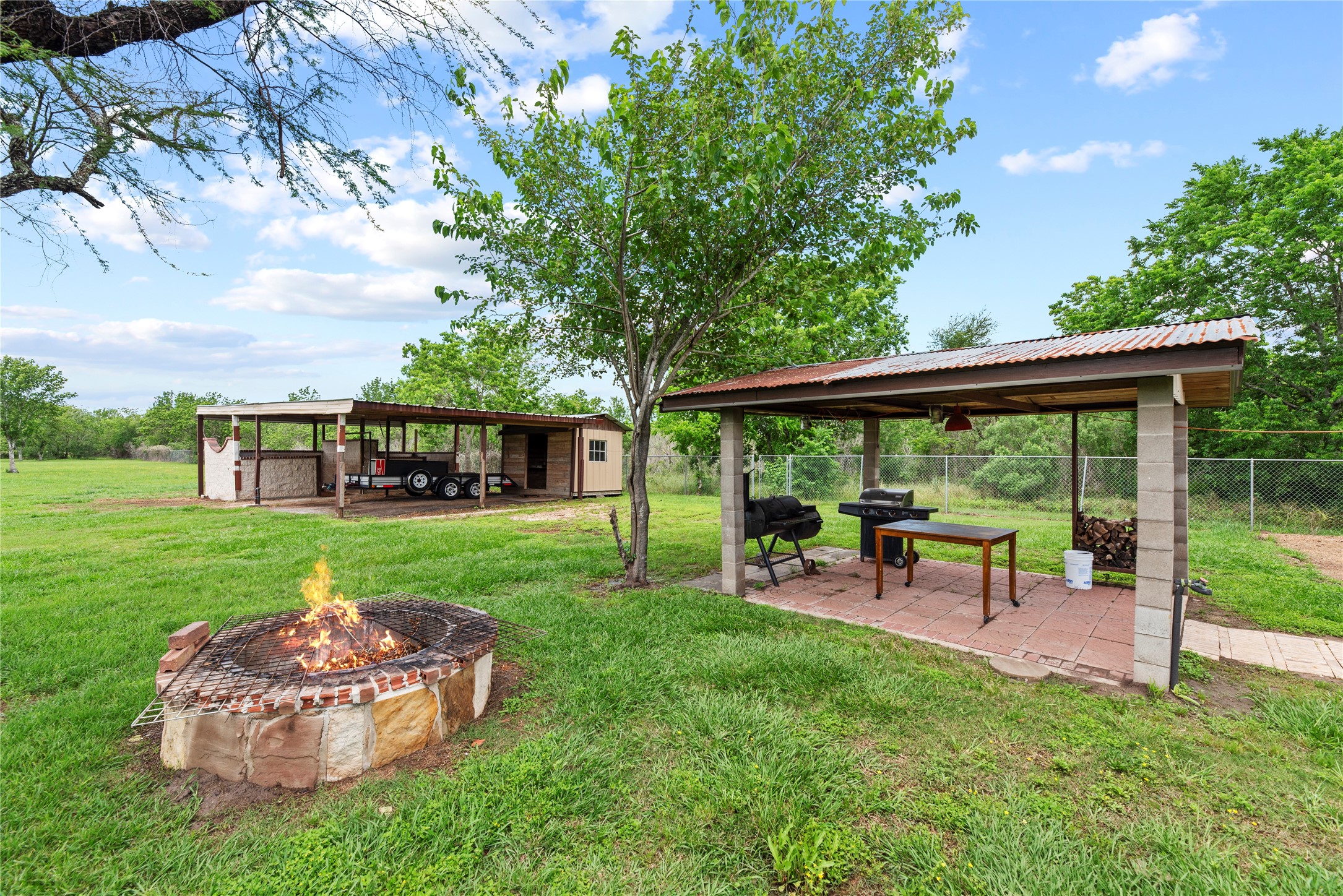 523 Moore Bar Road Rosenberg, TX 77471 - Photo 10 of 50 Here is a view of the grilling pavilion and the firepit.