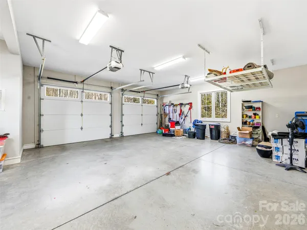 a view of a storage room with utility and racks