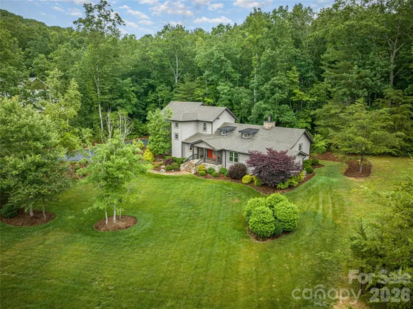 a view of a house with a big yard