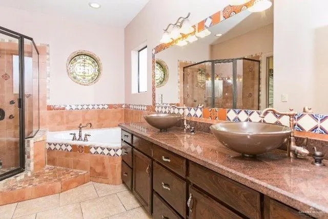 a view of a bathroom with a sink and a mirror