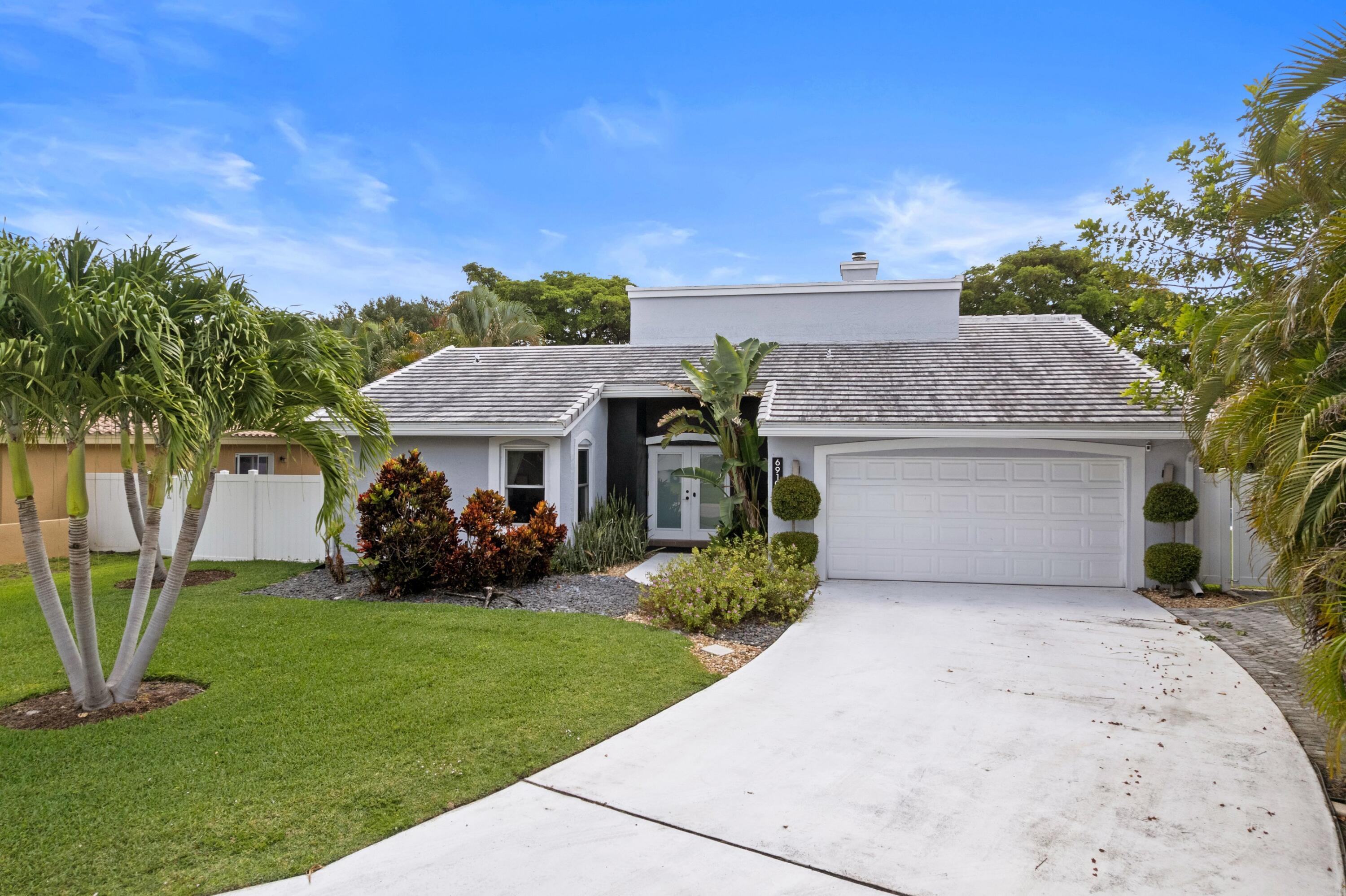 6910 Northwest 2nd Terrace Boca Raton, FL 33487 - Photo 33 of 49 Front Exterior